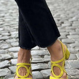 Square-toed sandals with round cut-out patterns