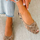 Open-toe flat sandals with woven straps
