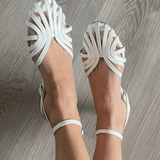 Silver-colored round-toed strap sandals