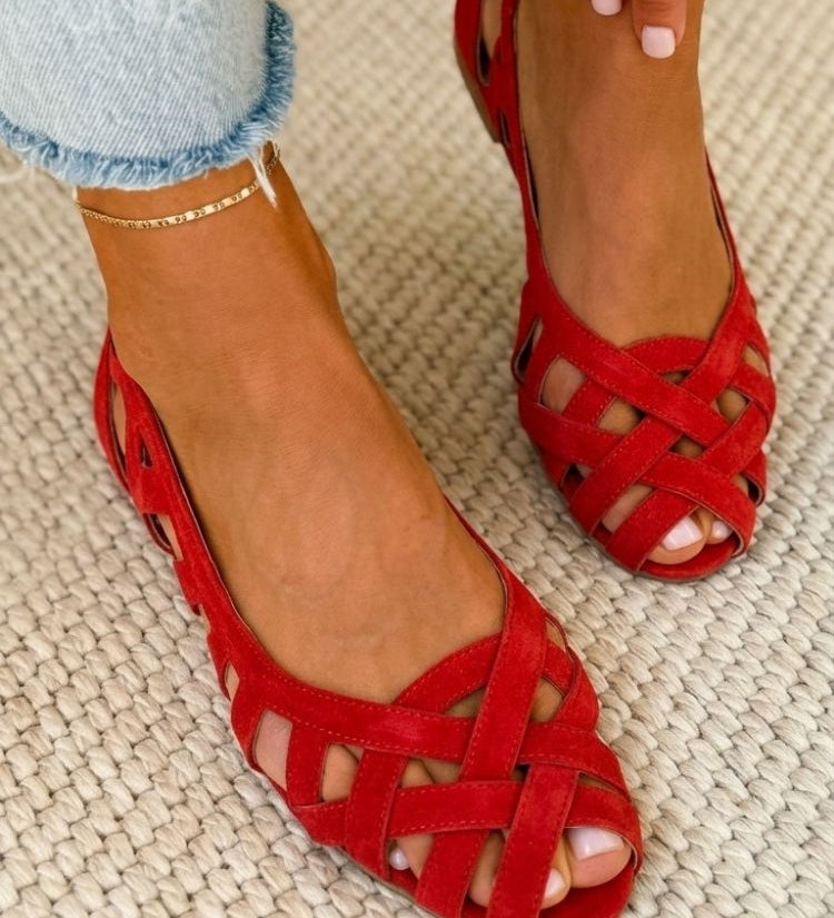 Open-toe flat sandals with woven straps
