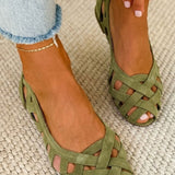 Open-toe flat sandals with woven straps