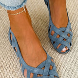 Open-toe flat sandals with woven straps