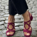 Square-toed sandals with round cut-out patterns